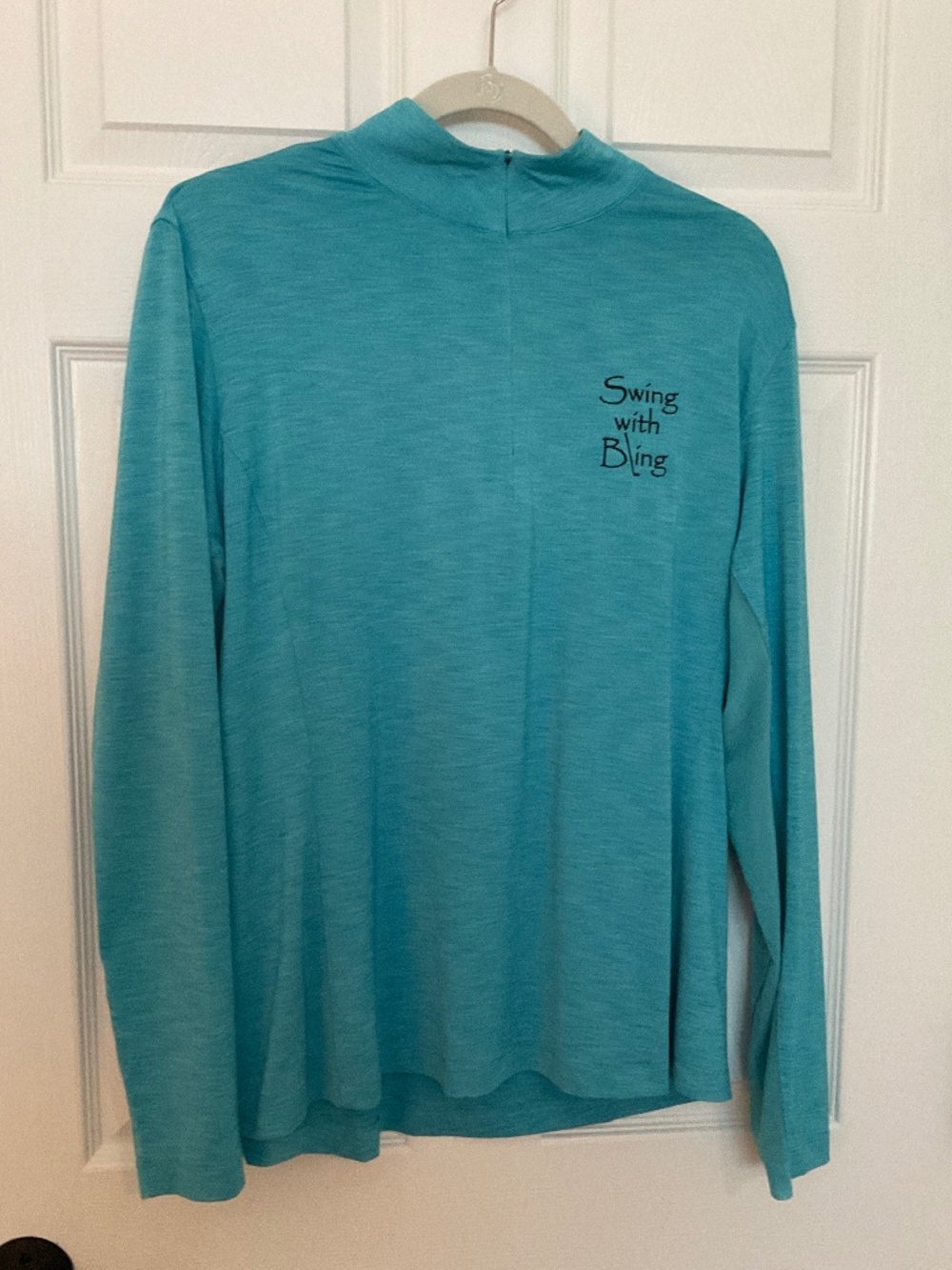 LADIES HALF ZIP, LONG SLEEVE GOLF SHIRT.  SIZE XL.  PRETTY TURQUOISE.
